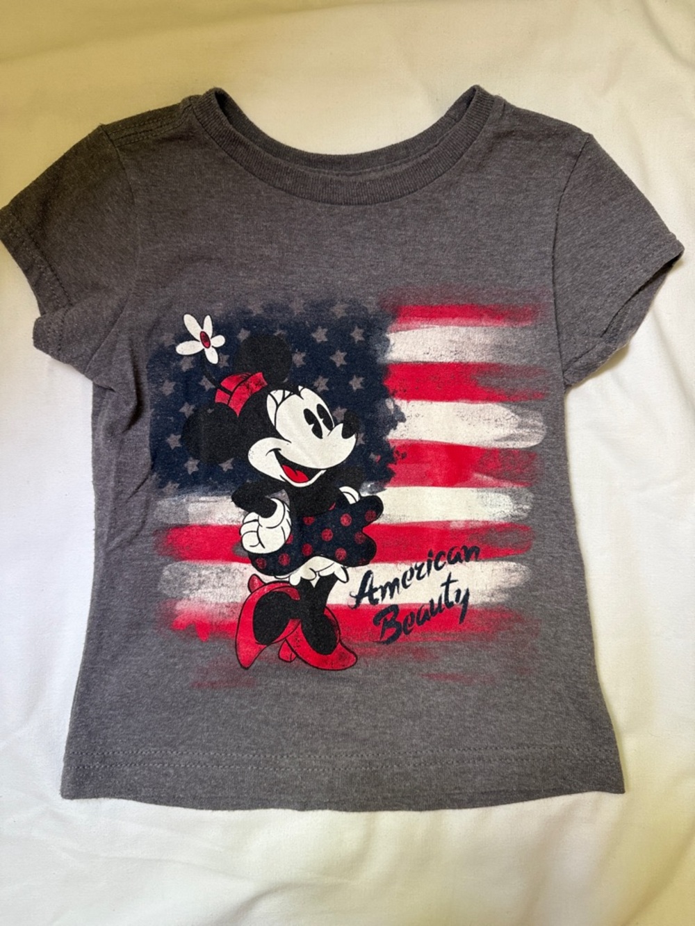 Disney Charcoal Minnie Mouse Tee with Red and White Flag Graphic